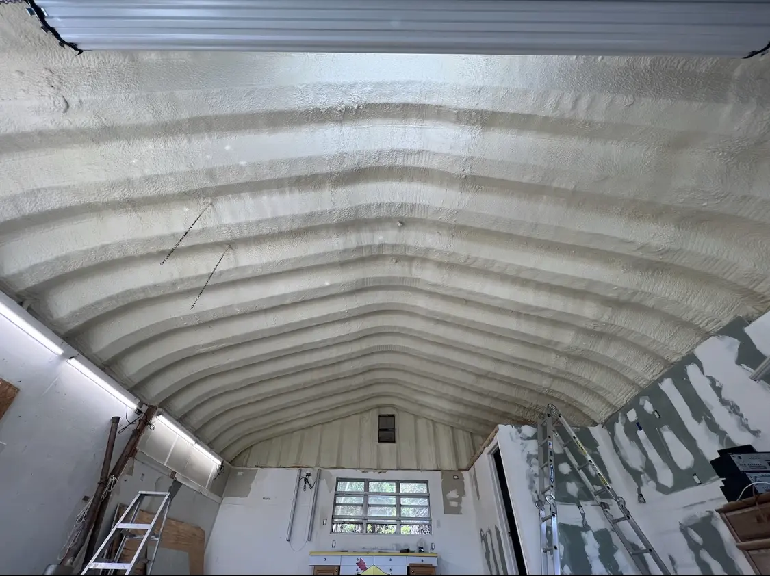 Spray polyurethane foam applied to the underside of a metal roof deck in Barrington